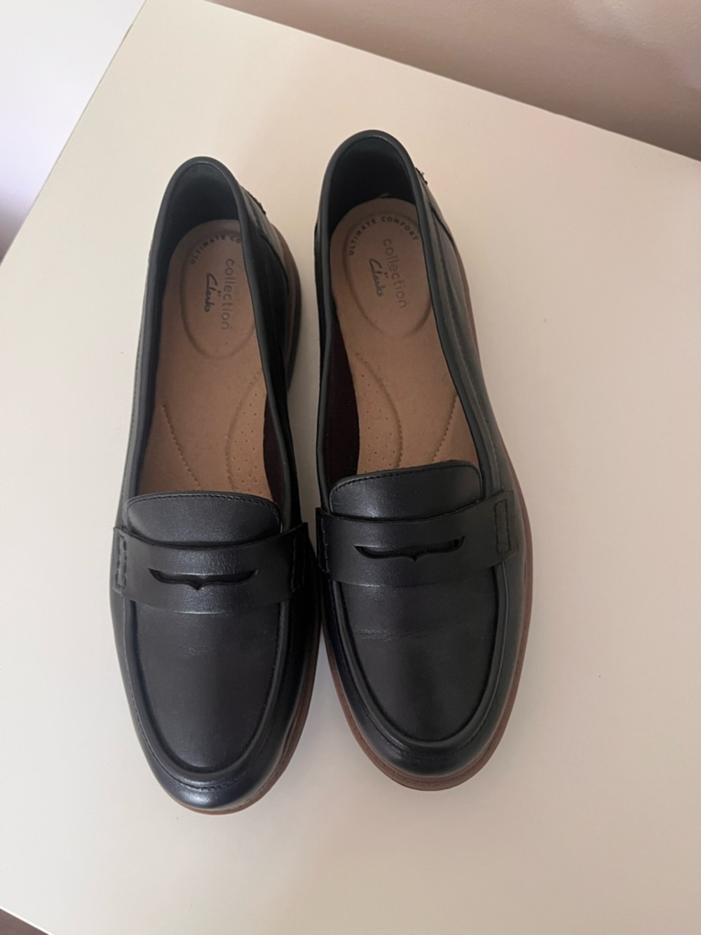 Clarks Black Leather Penny Loafers with Brown Sole Trim